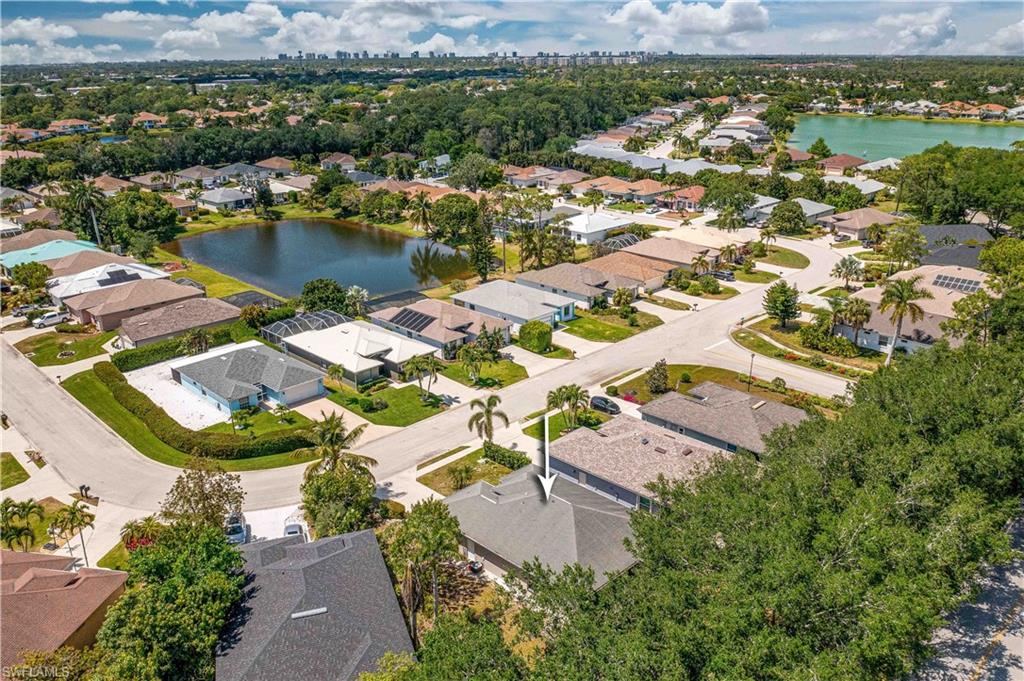 238 Stanhope Circle Naples, FL 34104 - Photo 5 of 33 an aerial view of residential houses with outdoor space