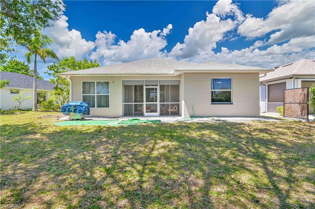 238 Stanhope Circle Naples, FL 34104 - Photo 6 of 33 a view of a house with a backyard