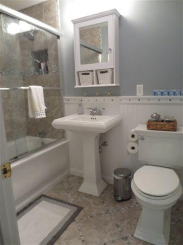 502 Skunknet Road Centerville, MA 02632 - Photo 12 of 24 a bathroom with a sink toilet and shower