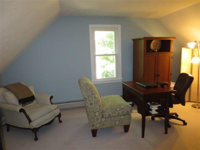 502 Skunknet Road Centerville, MA 02632 - Photo 16 of 24 a living room with furniture and a window
