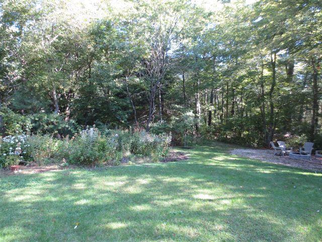 502 Skunknet Road Centerville, MA 02632 - Photo 19 of 24 a view of outdoor space with deck and yard