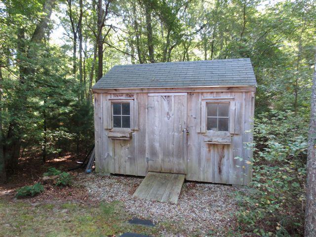 502 Skunknet Road Centerville, MA 02632 - Photo 23 of 24 a backyard of a house