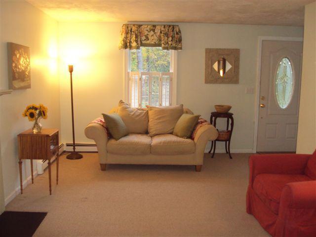 502 Skunknet Road Centerville, MA 02632 - Photo 3 of 24 a living room with furniture and a window