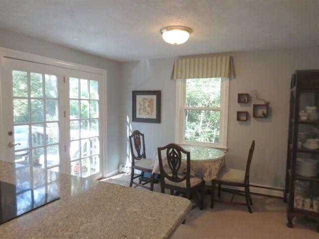 502 Skunknet Road Centerville, MA 02632 - Photo 6 of 24 a view of a livingroom with furniture window and outside view