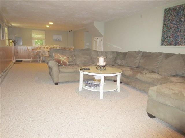 502 Skunknet Road Centerville, MA 02632 - Photo 8 of 24 a living room with furniture and a table