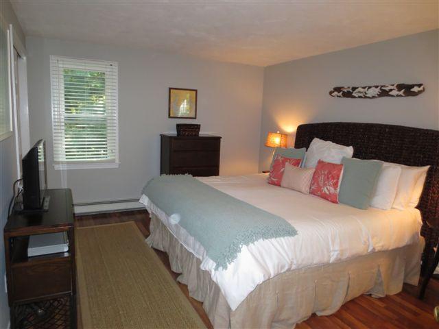 502 Skunknet Road Centerville, MA 02632 - Photo 10 of 24 a bedroom with bed and window