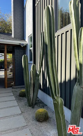 a view of outdoor with furniture and a floor to ceiling window