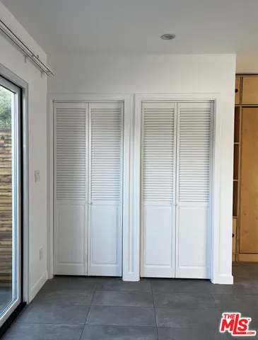 a view of room with hardwood floor