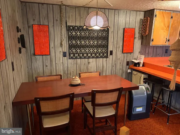 a room with furniture and a flat screen tv