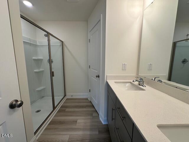 739 Rdg Clf Lane Zebulon, NC 27597 - Photo 12 of 22 a bathroom with a double vanity sink and mirror