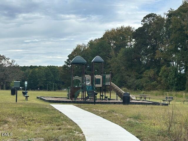 739 Rdg Clf Lane Zebulon, NC 27597 - Photo 19 of 22 a view of a park with large trees
