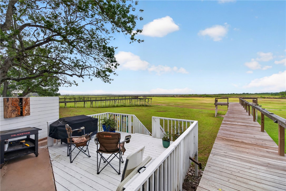 24937 County Road 350 Mathis, TX 78368 - Photo 36 of 39 a view of swimming pool with outdoor seating and plants