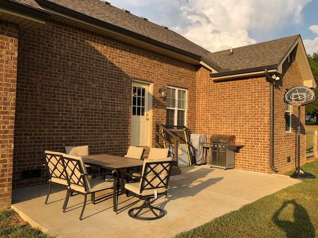 204 Goshen Road Lebanon, TN 37087 - Photo 21 of 24 a view of a patio with table and chairs