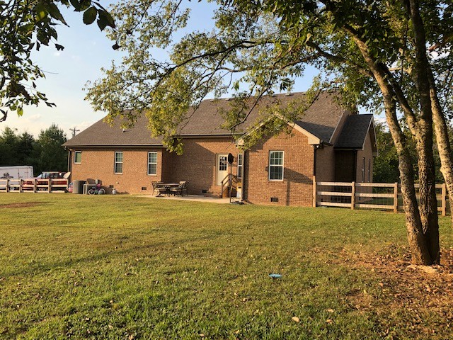 204 Goshen Road Lebanon, TN 37087 - Photo 22 of 24 a front view of a house with a garden