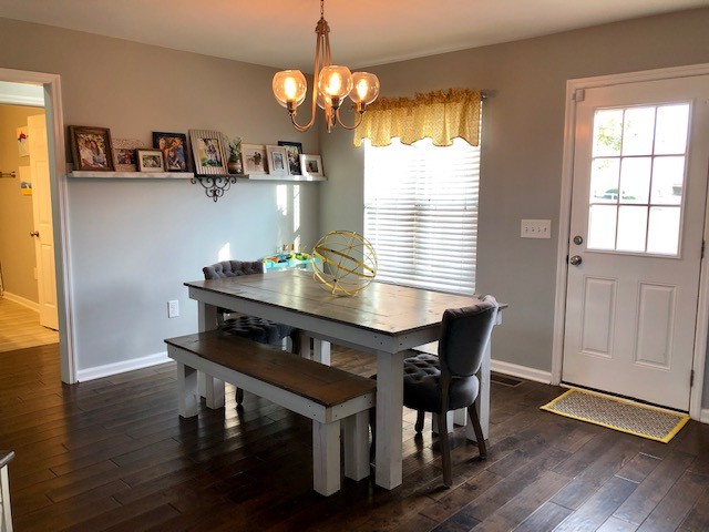 204 Goshen Road Lebanon, TN 37087 - Photo 5 of 24 a view of a dining room with furniture window and wooden floor