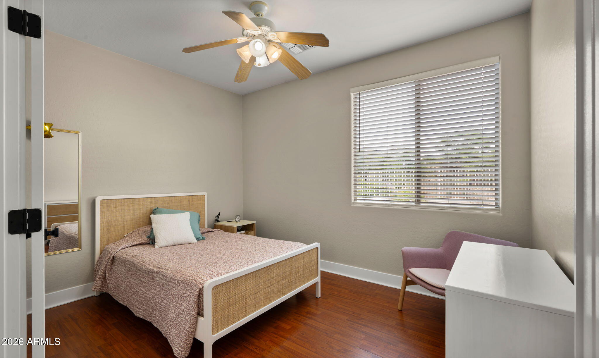 3344 East Hopkins Road Gilbert, AZ 85295 - Photo 15 of 32 a bedroom with a bed and a desk