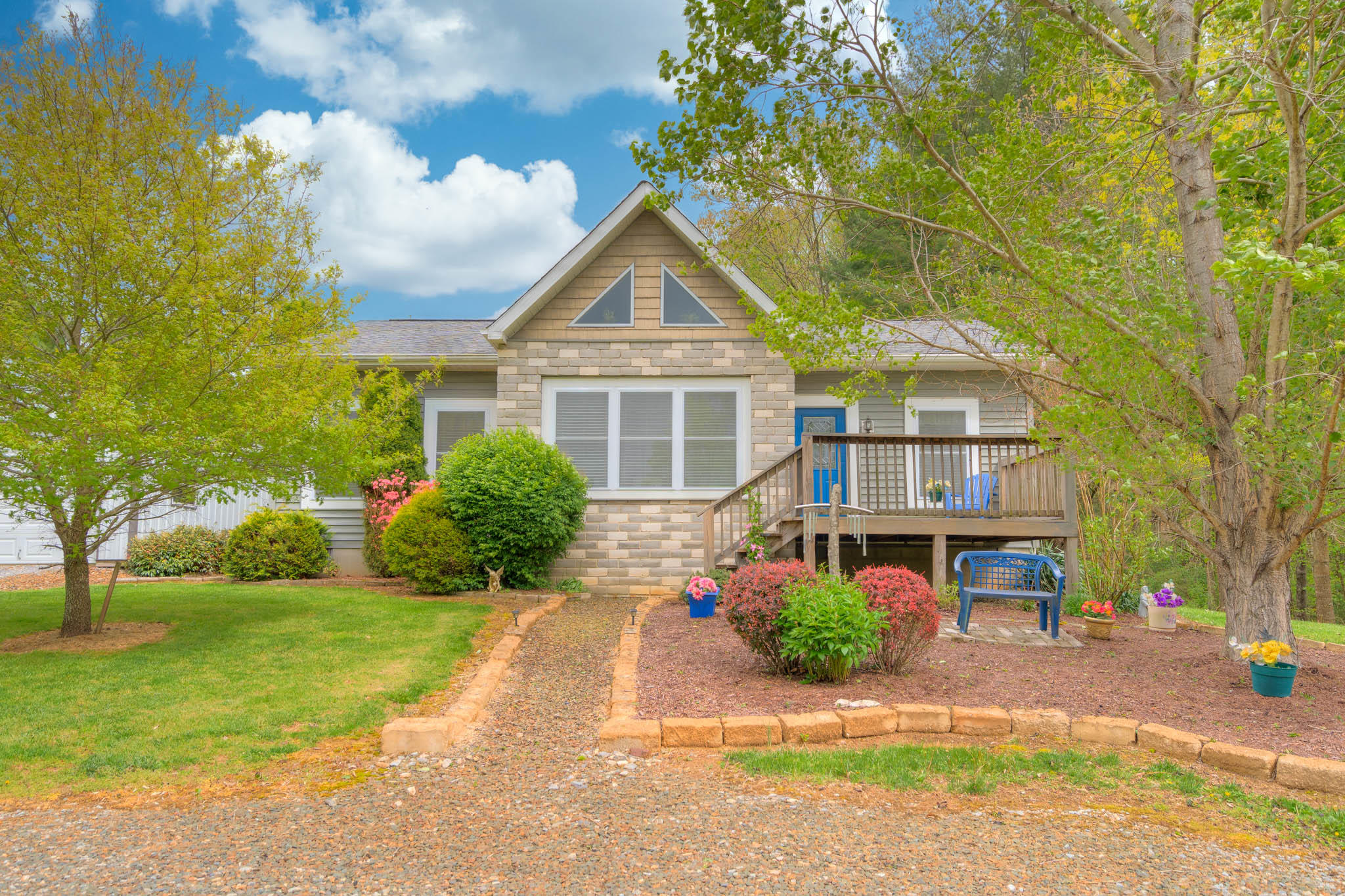 355 Sam Reed Road Northwest Floyd, VA 24091 - Photo 2 of 37 a front view of a house with yard and green space