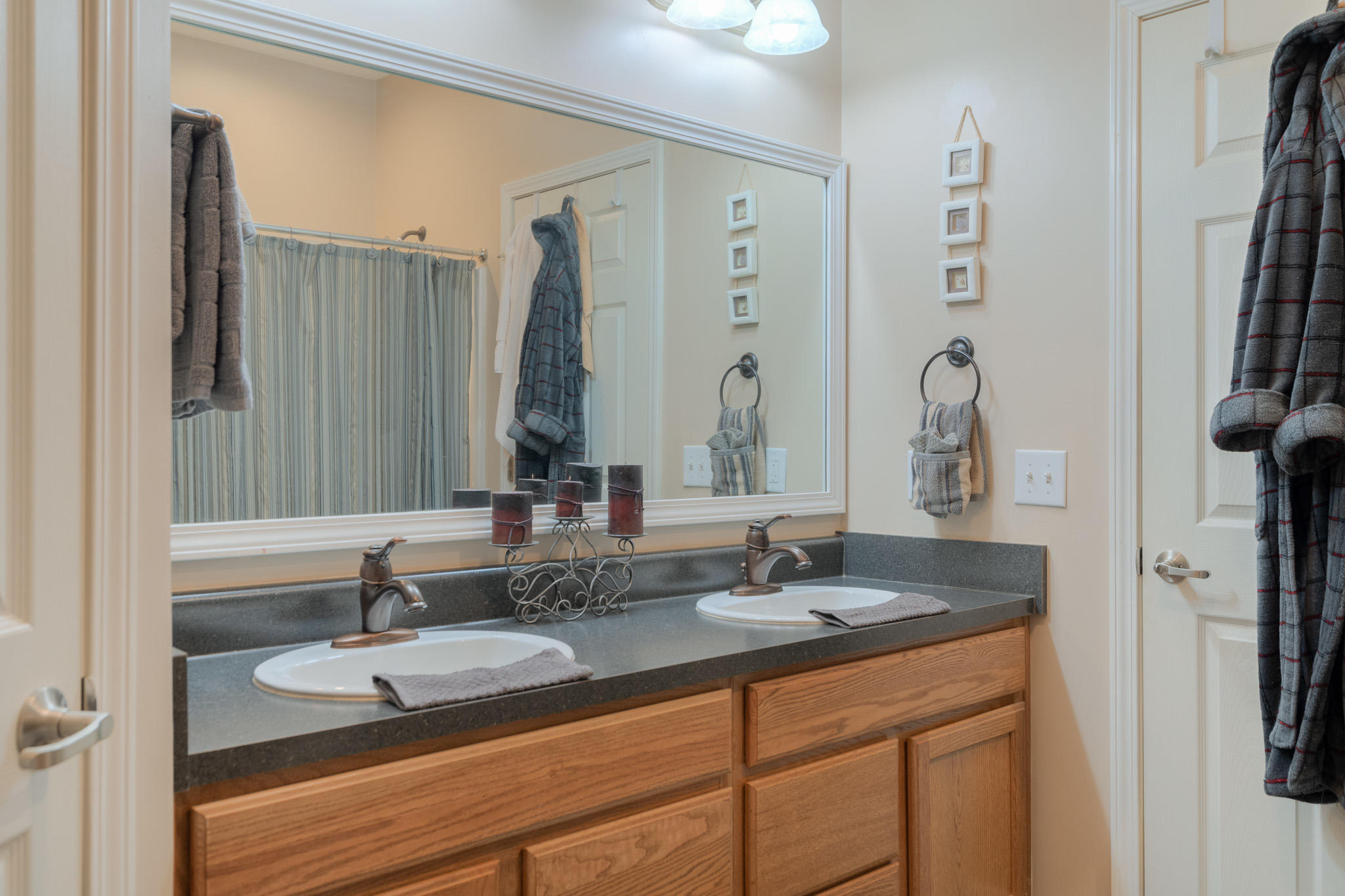 355 Sam Reed Road Northwest Floyd, VA 24091 - Photo 20 of 37 a bathroom with double vanity sinks and a mirror