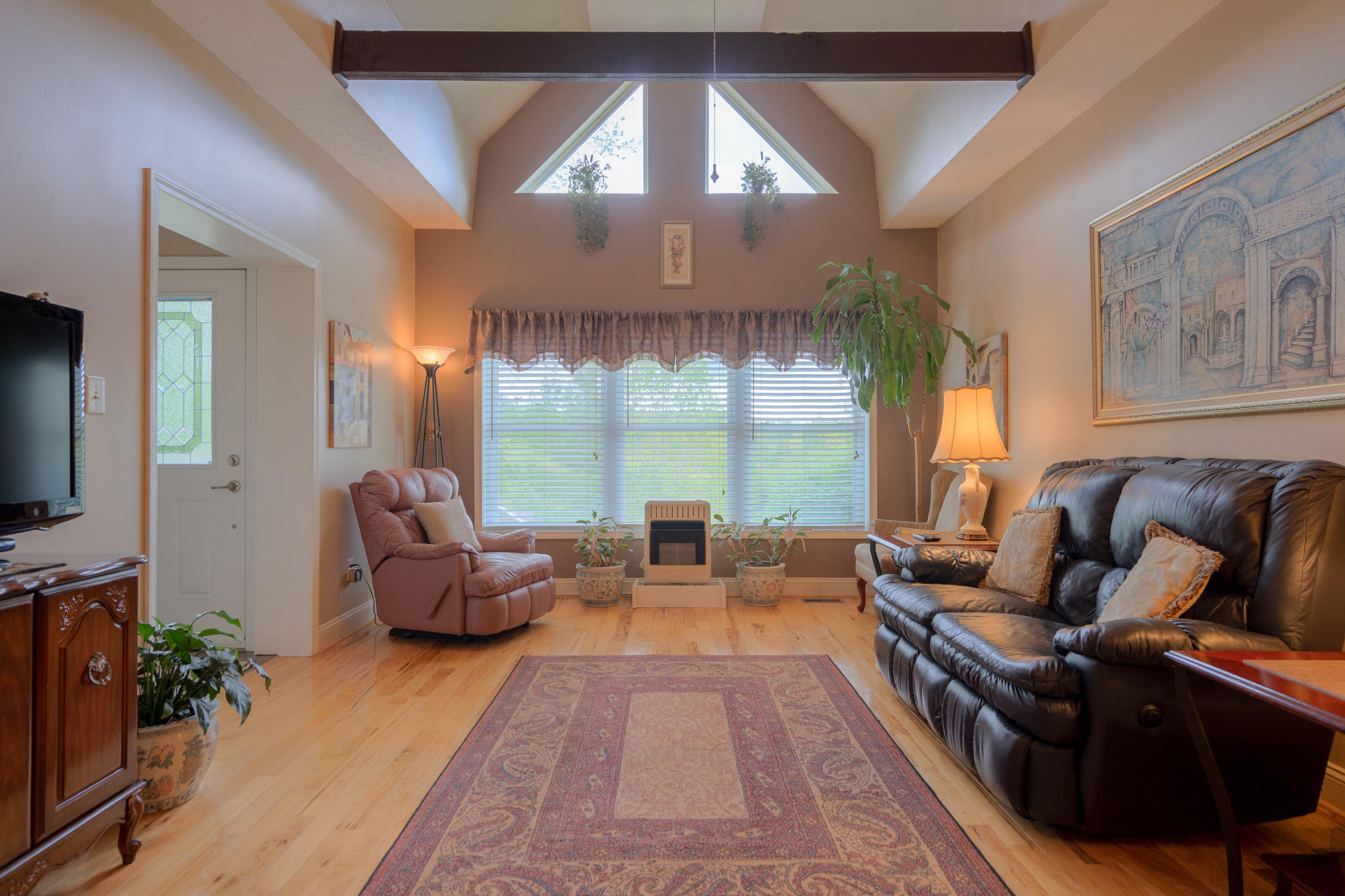 355 Sam Reed Road Northwest Floyd, VA 24091 - Photo 7 of 37 a living room with furniture and a large window