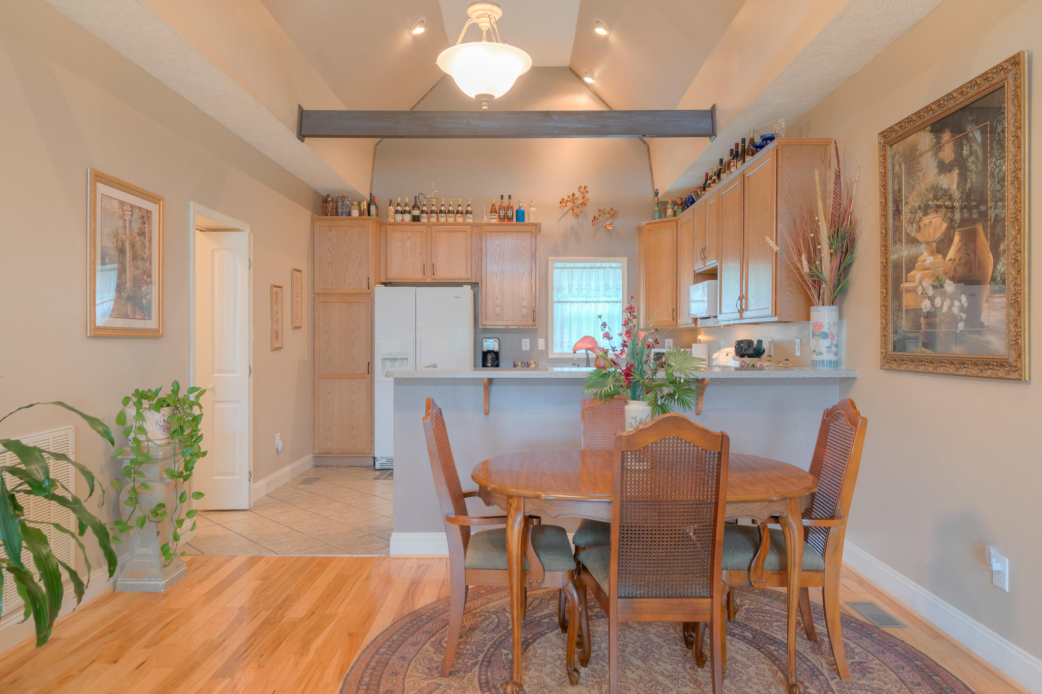 355 Sam Reed Road Northwest Floyd, VA 24091 - Photo 10 of 37 a view of a dining room with furniture and a potted plant