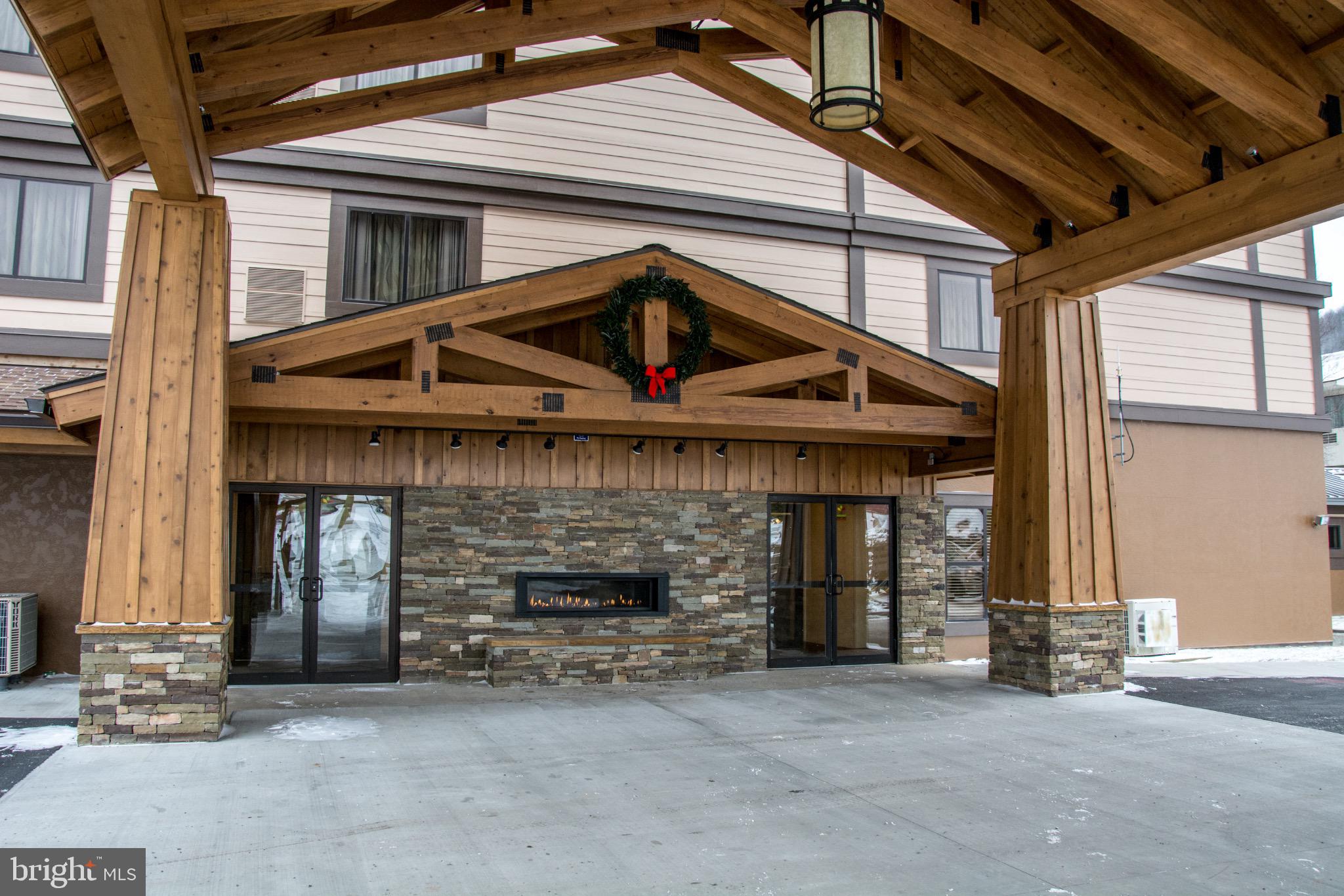 290 Marsh Hill Road, Unit 319C McHenry, MD 21541 - Photo 27 of 33 a view of a house with large windows