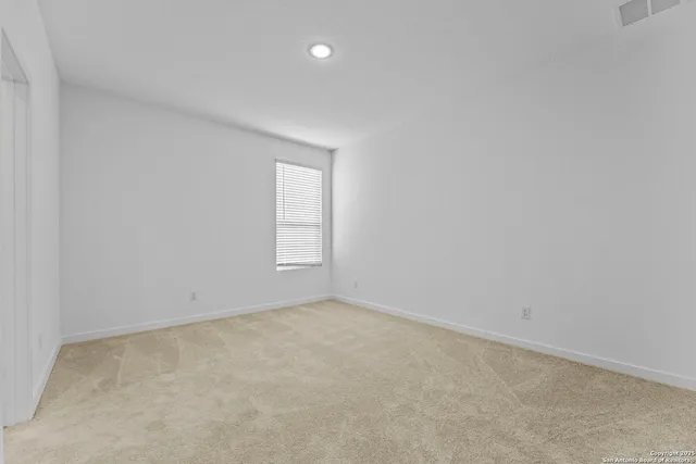 an empty room with a window