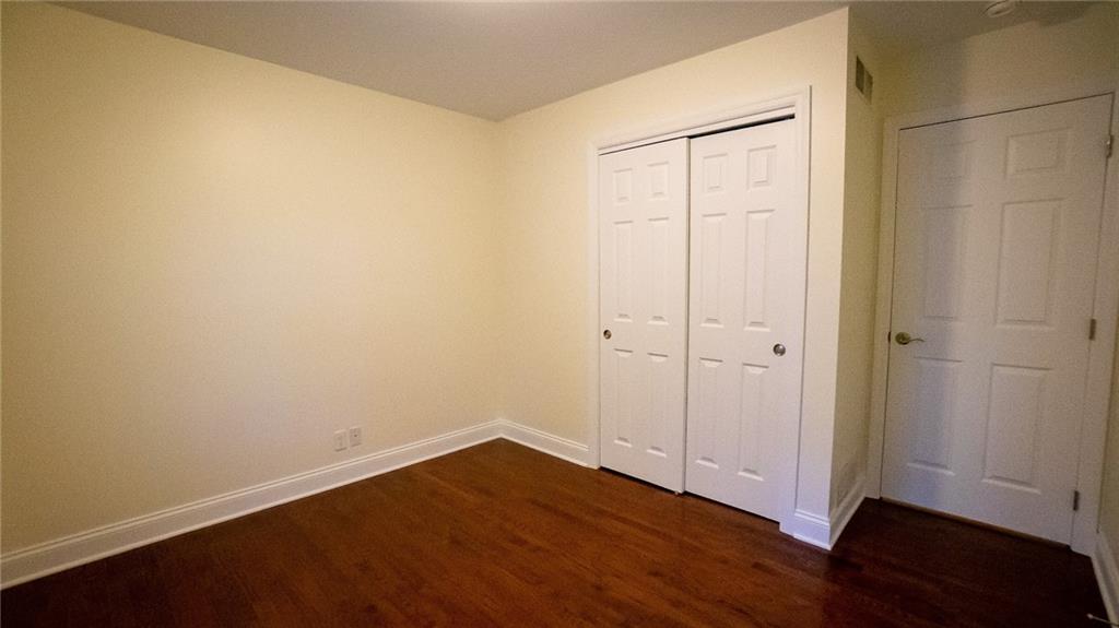 221 Old Plank Road Butler, PA 16002 - Photo 17 of 25 a view of an empty room with wooden floor