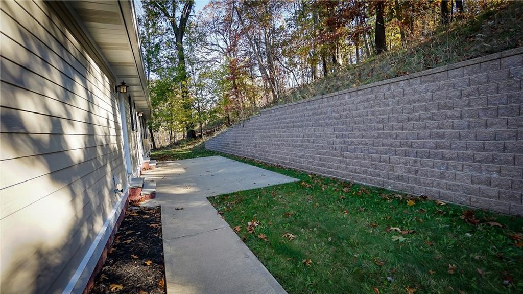 221 Old Plank Road Butler, PA 16002 - Photo 21 of 25 a view of a backyard with pathway