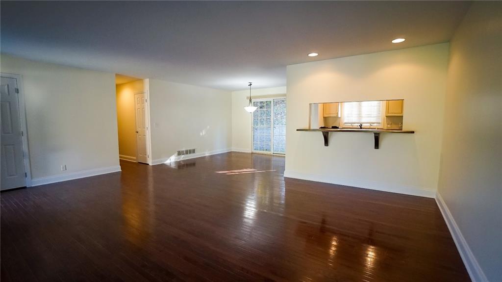 221 Old Plank Road Butler, PA 16002 - Photo 4 of 25 a view of a room with wooden floor and windows