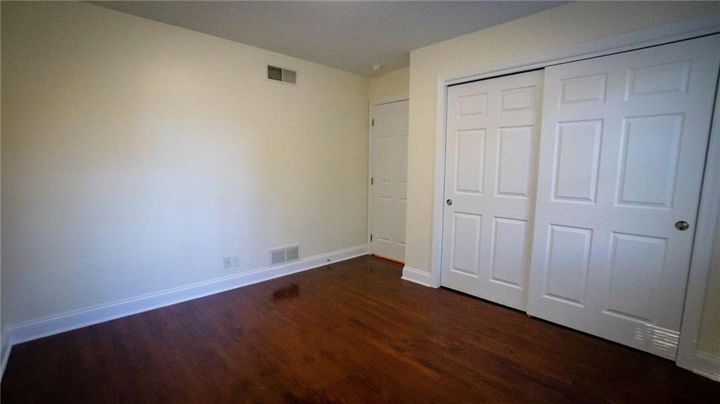 221 Old Plank Road Butler, PA 16002 - Photo 10 of 25 an empty room with wooden floor