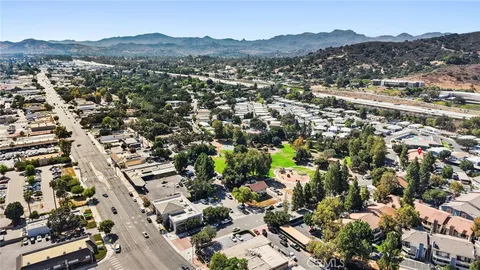 an aerial view of residential house with an outdoor space