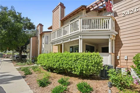 a front view of a multi story residential apartment building