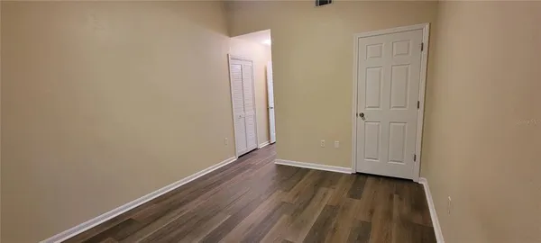 a view of small space with wooden floor