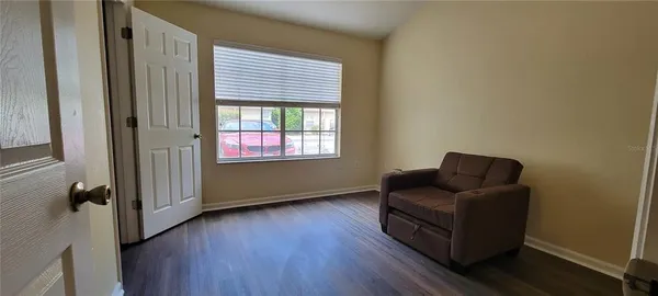 a room with furniture and a window