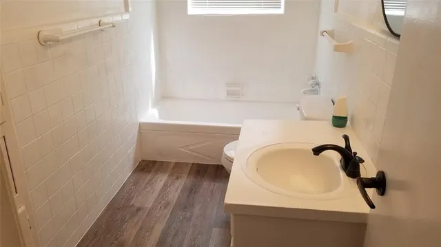 a bathroom with a sink and a vanity