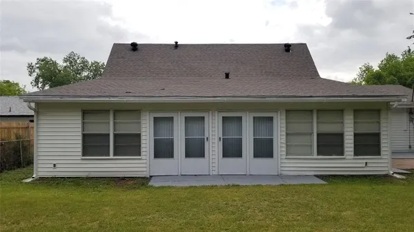 a view of a house with a garden