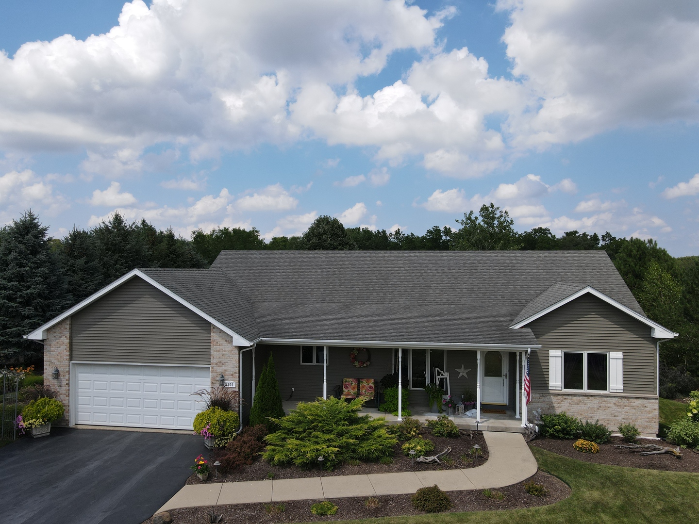 8701 South Rood Road Kingston, IL 60145 - Photo 1 of 26 front view of house with a yard