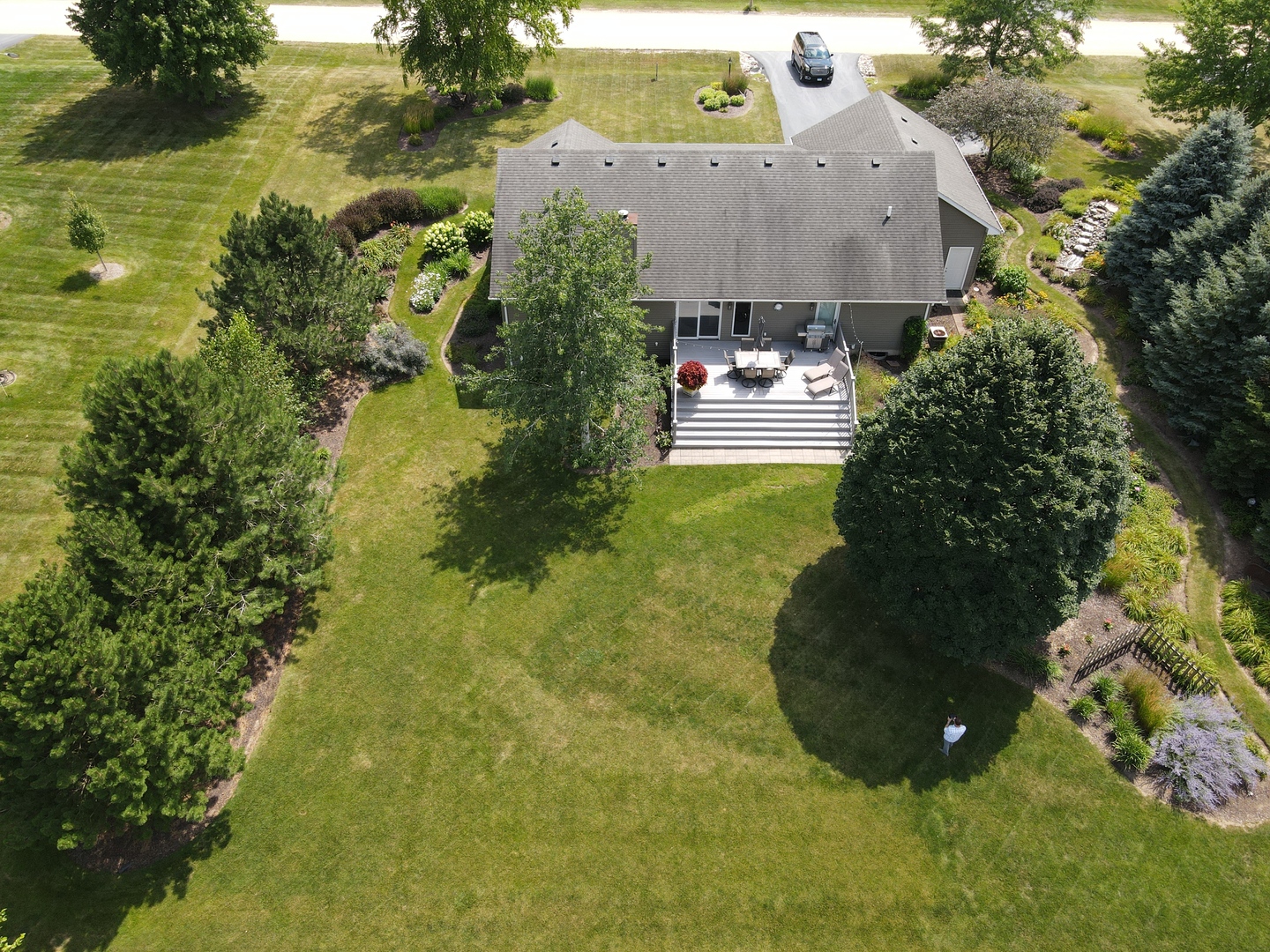 8701 South Rood Road Kingston, IL 60145 - Photo 19 of 26 a aerial view of a house with pool yard and outdoor seating