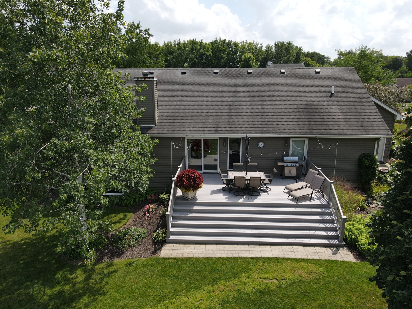 8701 South Rood Road Kingston, IL 60145 - Photo 20 of 26 a view of house with a yard and sitting area