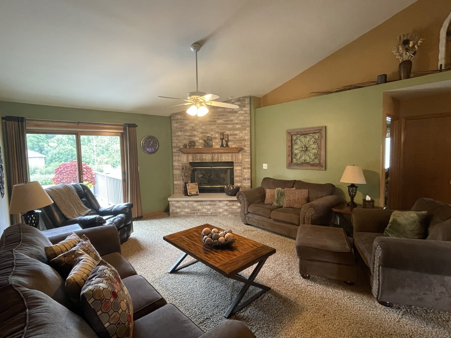 8701 South Rood Road Kingston, IL 60145 - Photo 4 of 26 a living room with furniture and a fireplace