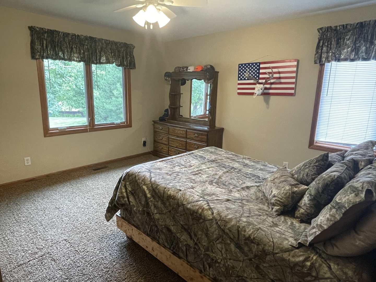 8701 South Rood Road Kingston, IL 60145 - Photo 10 of 26 a bedroom with a bed and a window