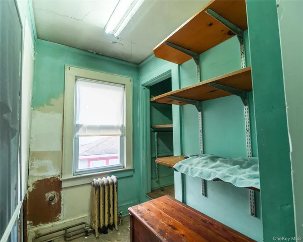 a room with furniture and window