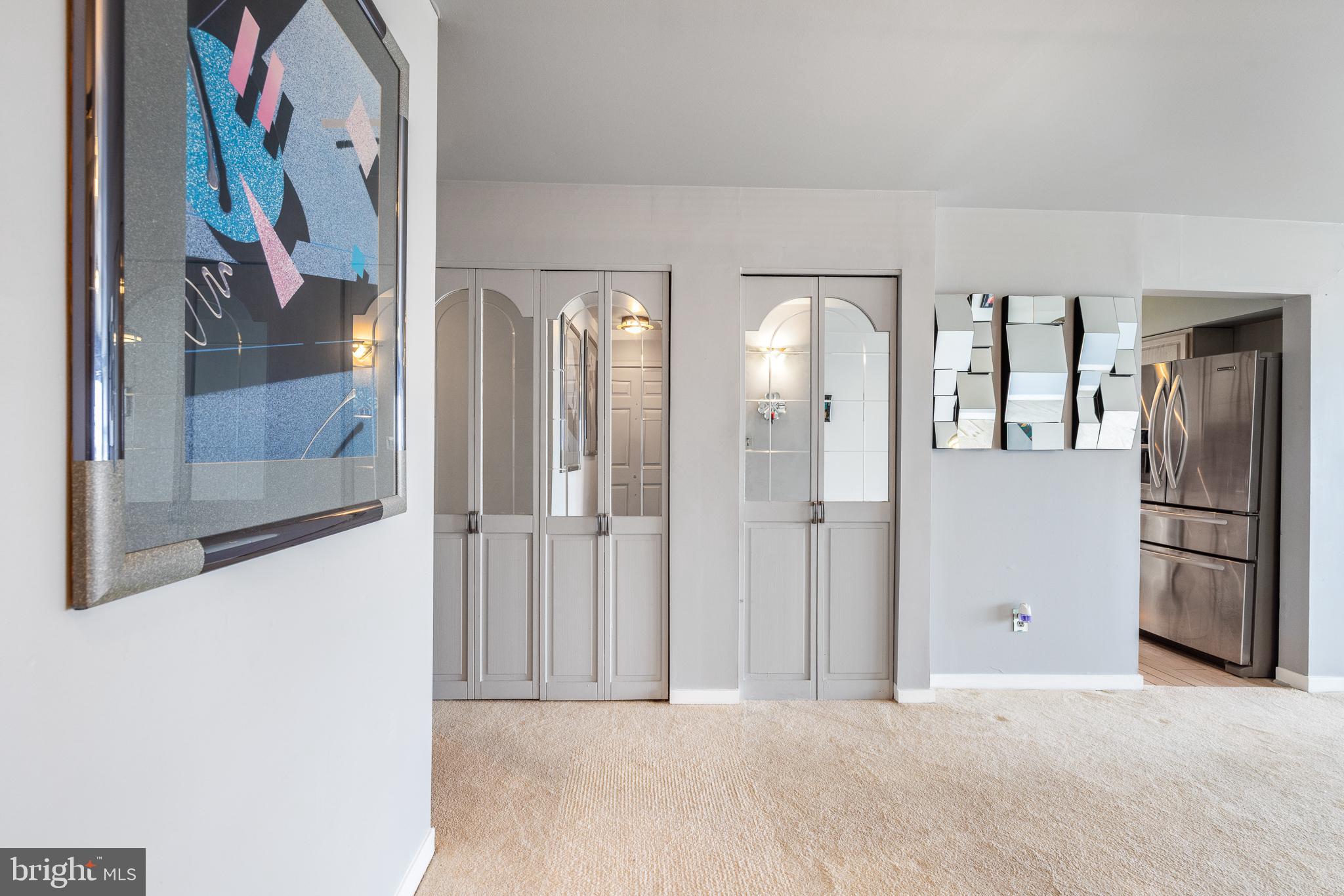 5213 Le Parc Drive, Unit 4 Wilmington, DE 19809 - Photo 15 of 37 a view of a hallway with wooden floor and entryway