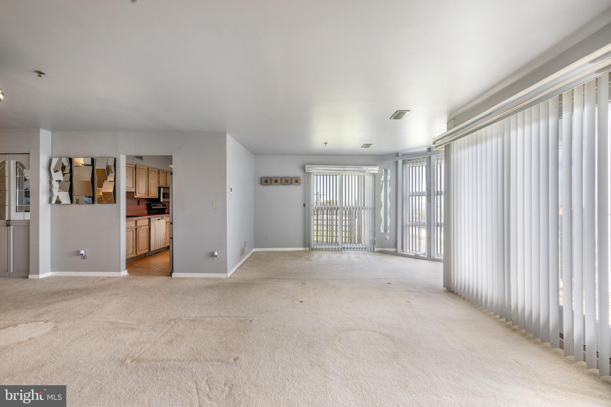 5213 Le Parc Drive, Unit 4 Wilmington, DE 19809 - Photo 18 of 37 a view of an empty room with window