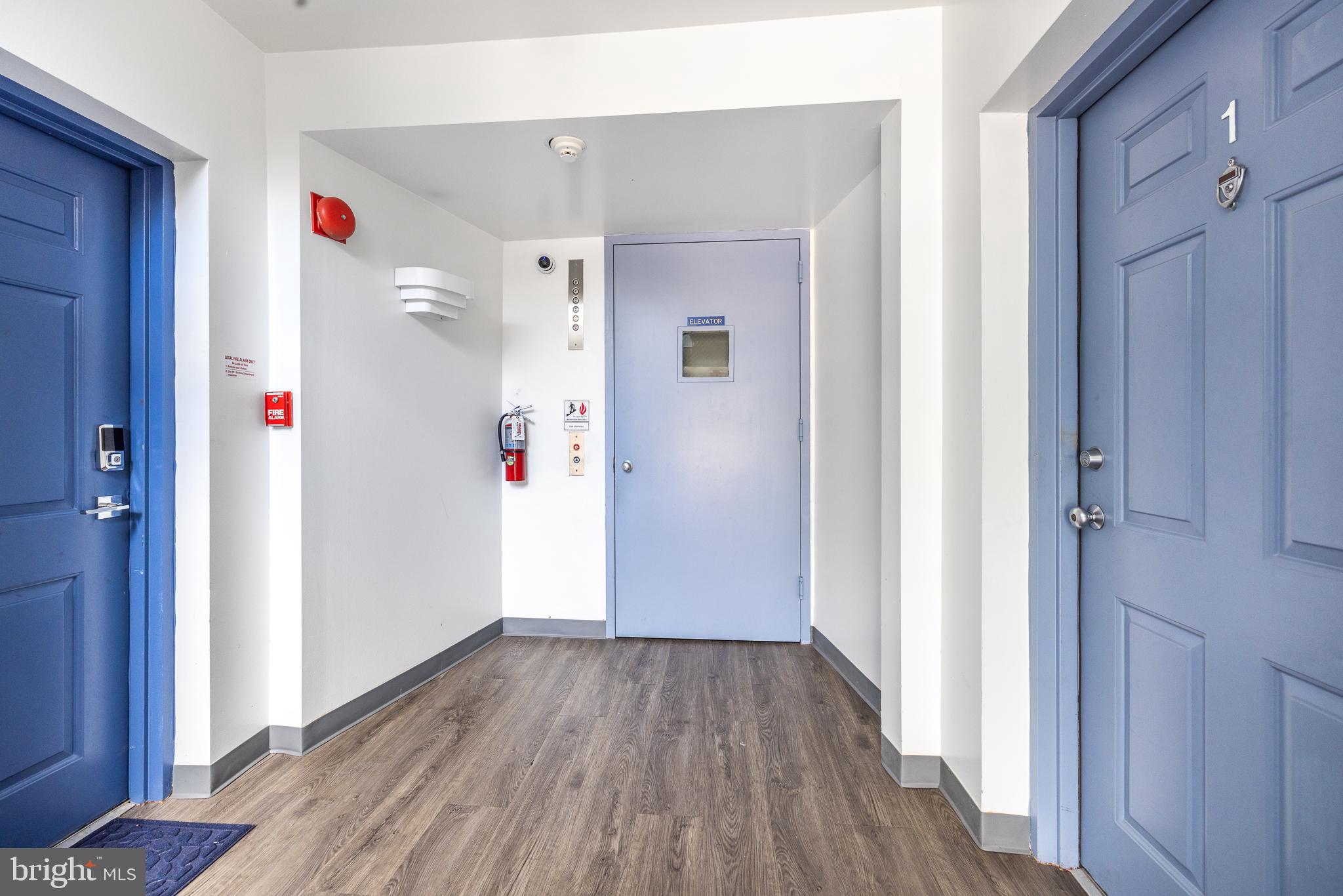 5213 Le Parc Drive, Unit 4 Wilmington, DE 19809 - Photo 9 of 37 a very nice looking room with wooden floor