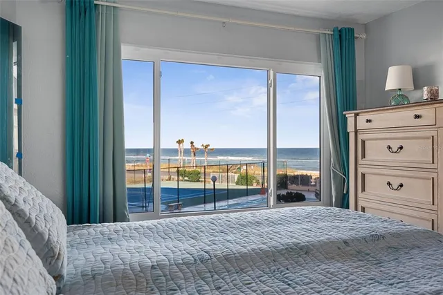 a view of a balcony and an ocean view