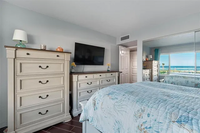 a bathroom with a sink vanity mirror and toilet