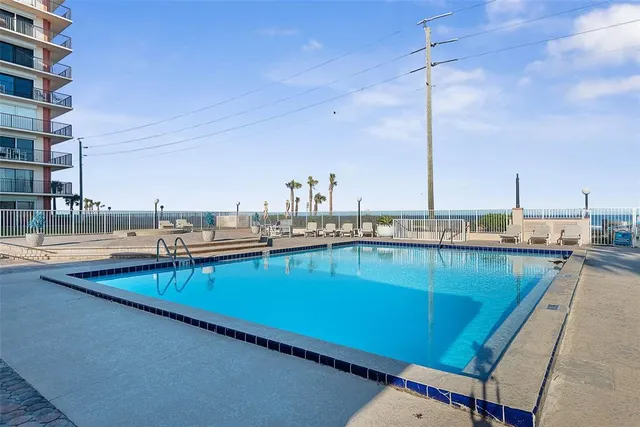 a view of swimming pool with a terrace