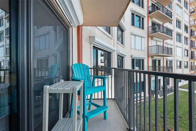 a view of a brick building from a balcony