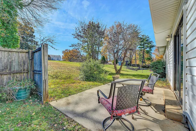 a view of a house with a big yard